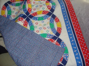 Blue backing on Baby Quilt